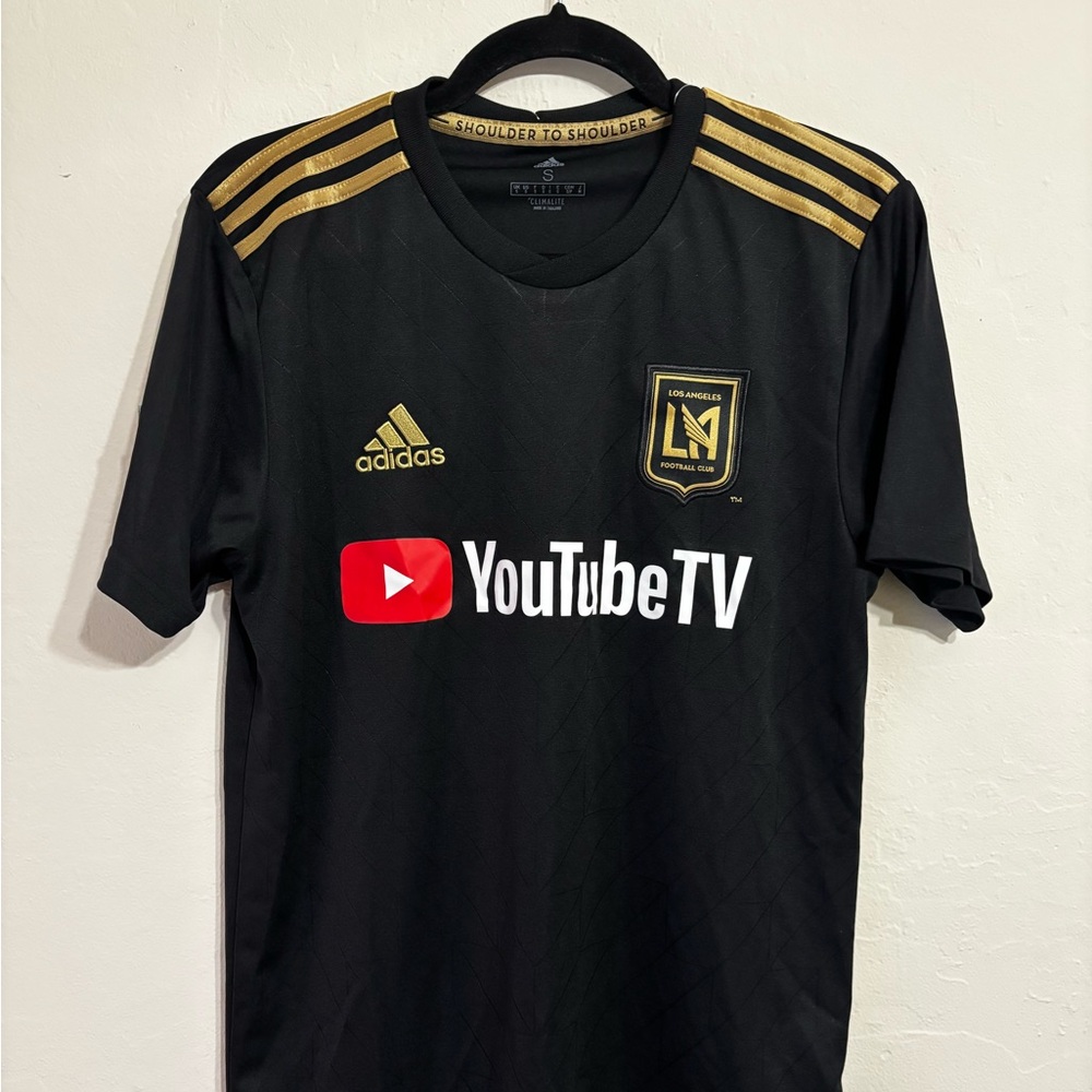 Adidas Black and Gold YouTube TV Logo